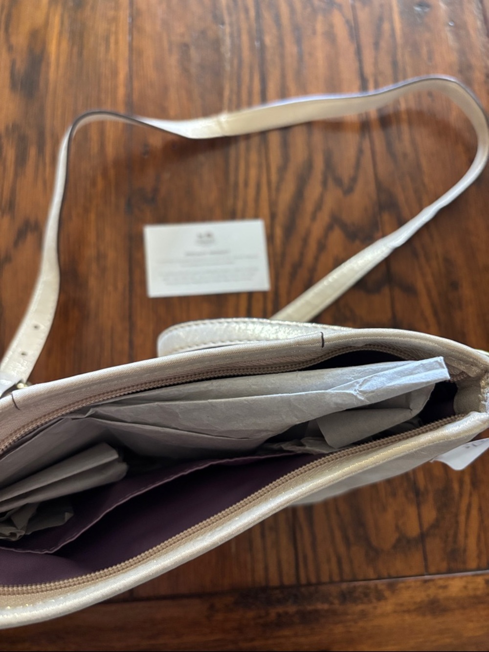 Coach Metallic Champagne Pebble Leather Crossbody
1 small indent from storing. - Picture 3 of 4